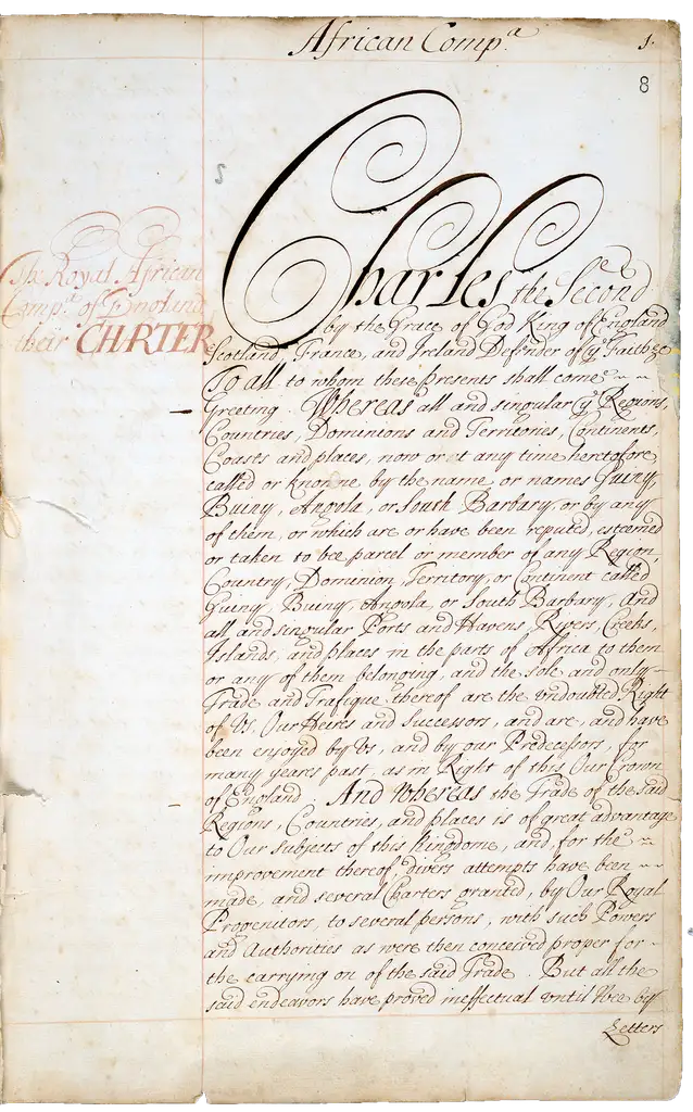 A hand-written royal charter with a large paragraph of text, the name Charles is clearly visible.