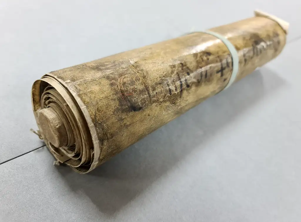 Wound-up roll of old parchment.