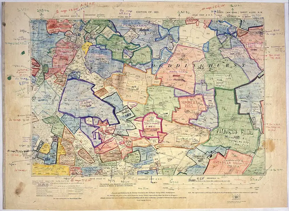 A map of an area which has been divided up into sections and coloured in by hand