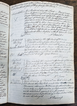 A handwritten entry in a law rule book dismissing a legal case.