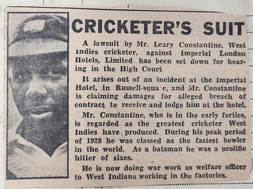 A newspaper clipping illustrated with an image of Learie Constantine in his cricket kit.