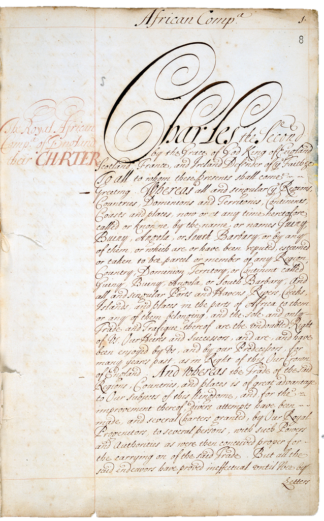 A hand-written royal charter with a large paragraph of text, the name Charles is clearly visible.