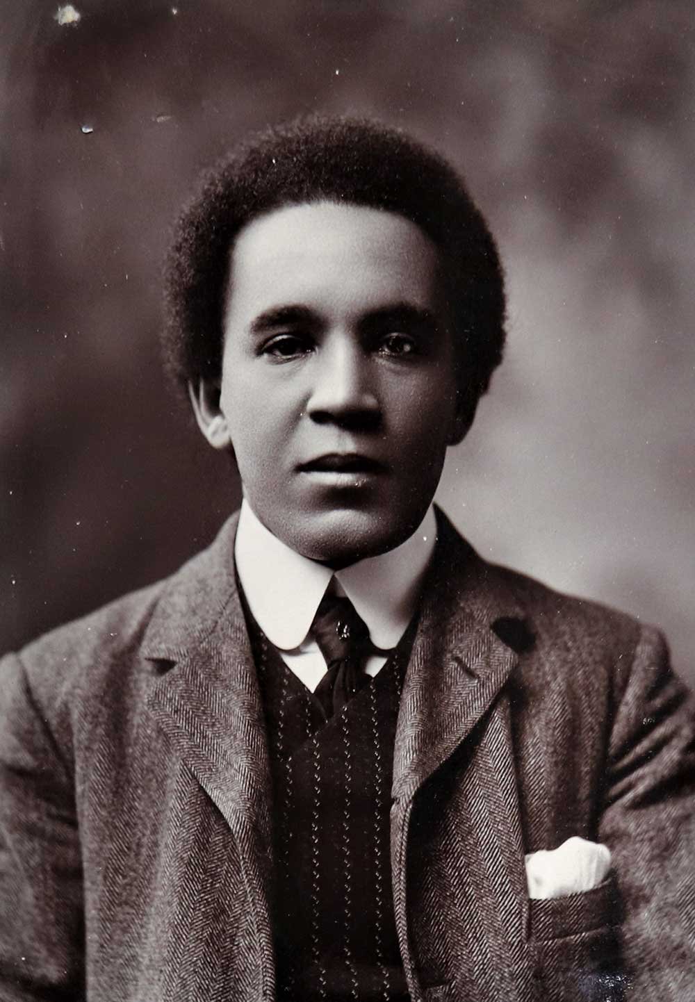 A head and shoulders shot of Coleridge-Taylor. He is face-on to the camera, wearing a smart suit.