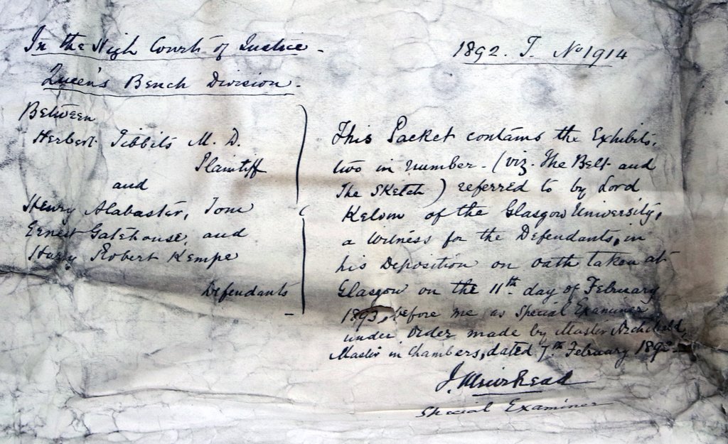 A handwritten note written on very well used paper, used as evidence in a libel case.