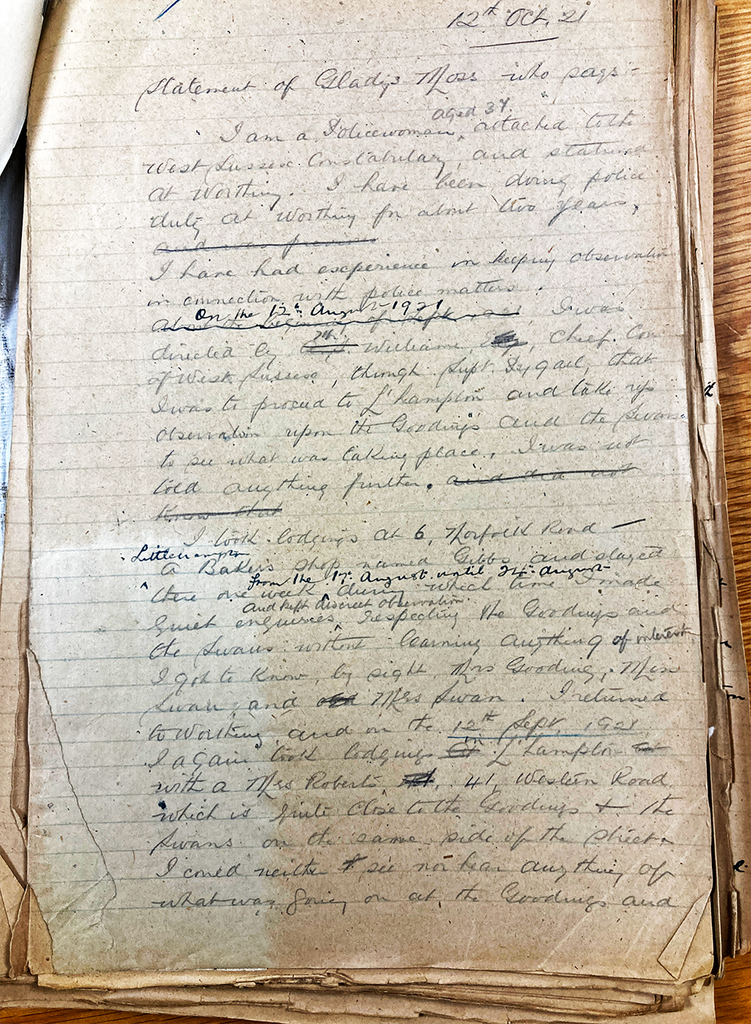 Sheet of lined paper with a handwritten statement with numerous crossings-out and additions in pen.