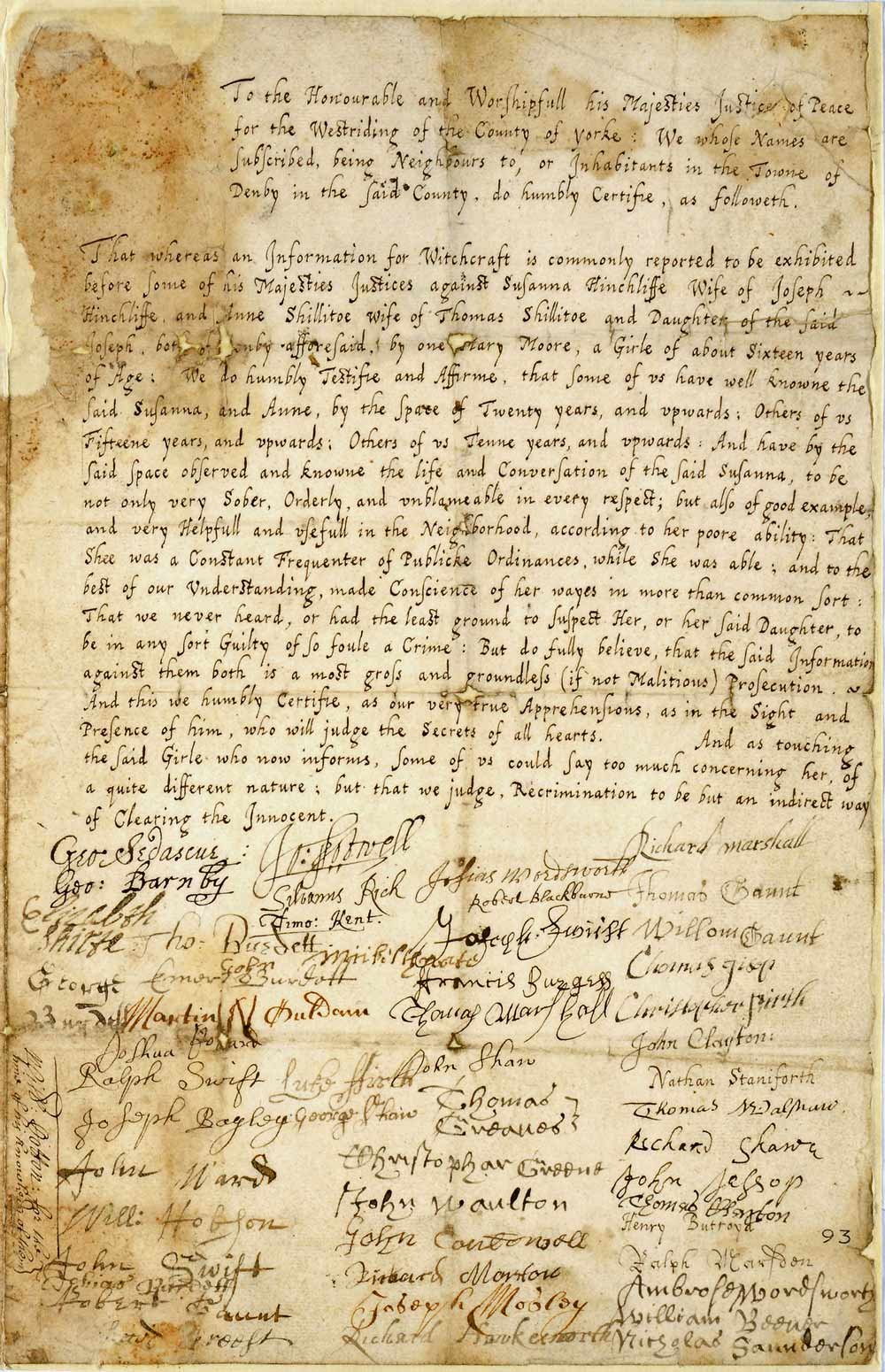 A large paragraph of clear, tidy handwriting above roughly 50 different signatures.