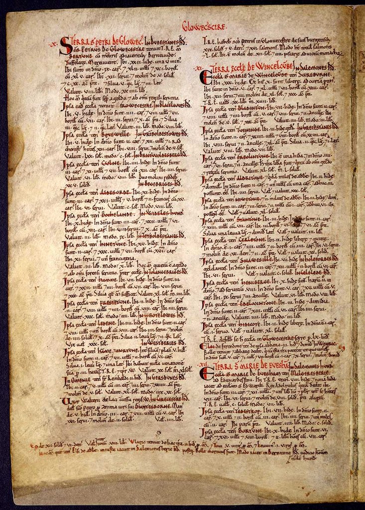 A medieval document with two columns of text in black and red ink