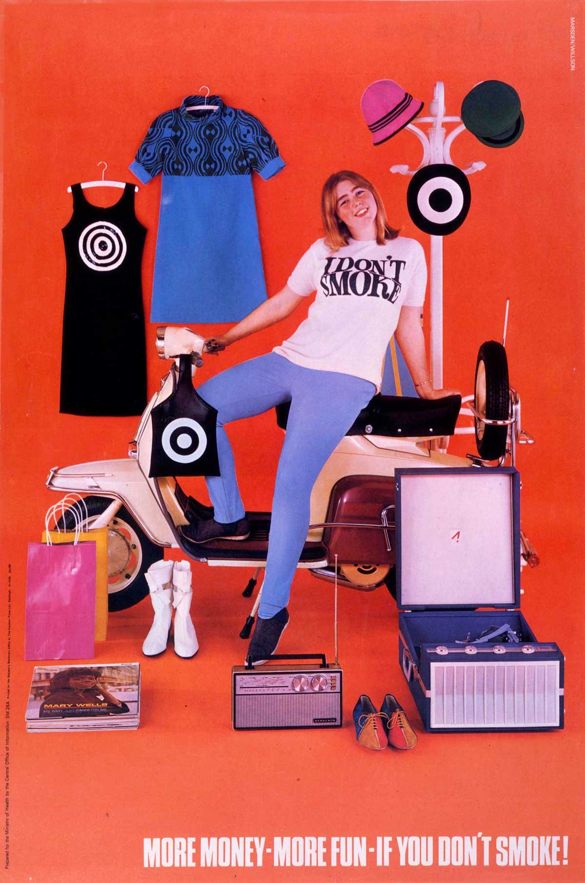 The words 'MORE MONEY-MORE FUN-IF YOU DON'T SMOKE!' below a woman surrounded by desirable goods.