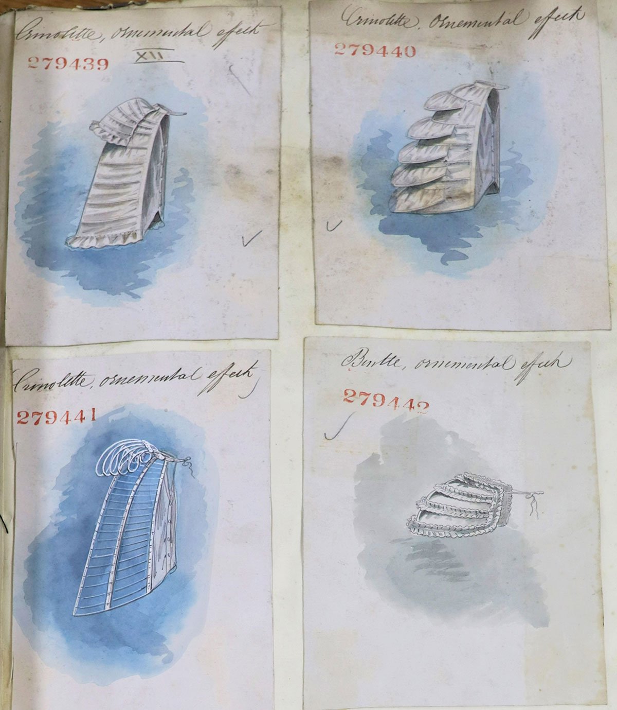 Four drawings of registered designs of women's clothing.