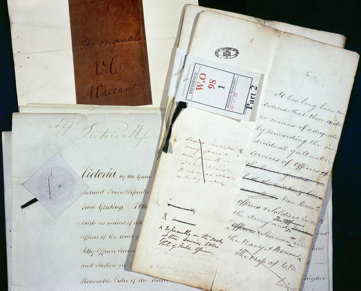 A pile of handwritten documents, one marked 'The original VC Warrant'.