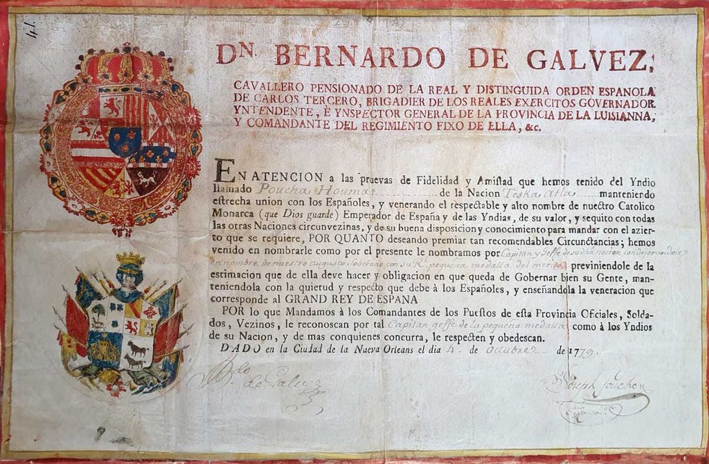 Printed page with a red border and two colourful crests and the heading 'Dn Bernardo de Galvez'.