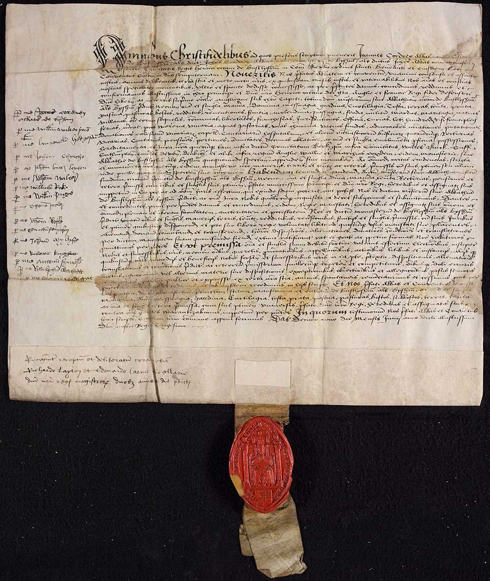 An impressive handwritten document with a large red wax seal hanging off the bottom