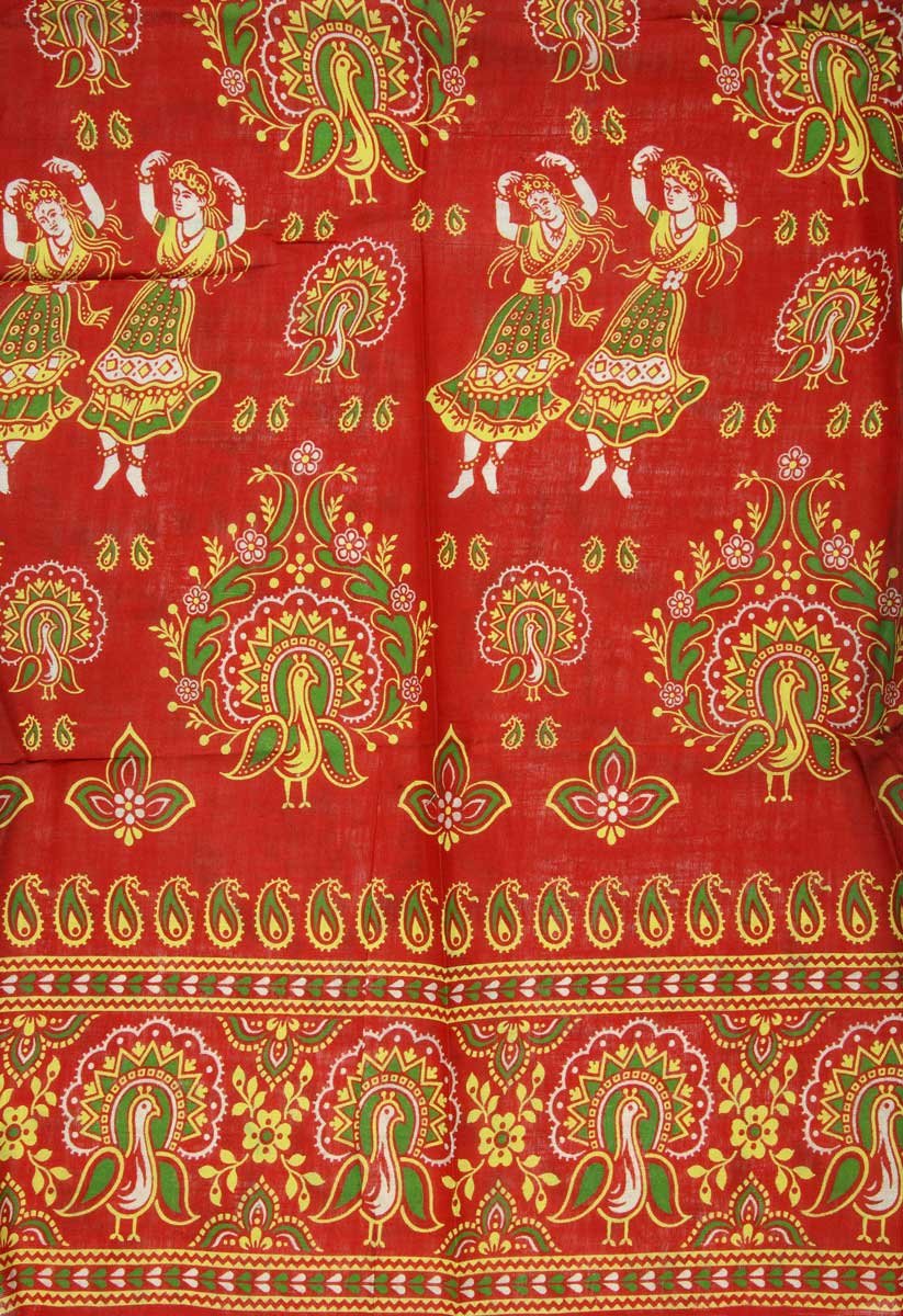 A red textile with yellow and green details including dancing women and a bird.