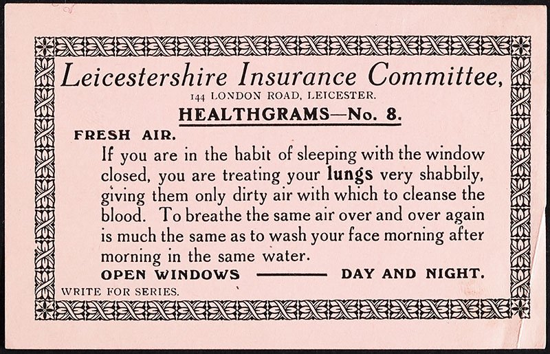 A small decorative card with advice on letting fresh air into your bedroom.