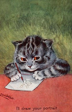 A grey cat leans over a piece of paper and holds a pencil in its hand. It's drawing a rabbit