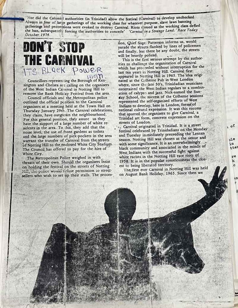 Newspaper article headed 'Don't stop the carnival'. In pen below, the words 'Its Black Power man.'